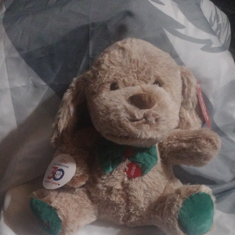 Charming Plush Dog Toy with Green Details